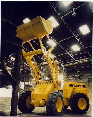 A JCB 410 wheeled loader with four-ram loader 